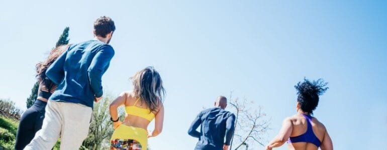 Group of runners training in a park